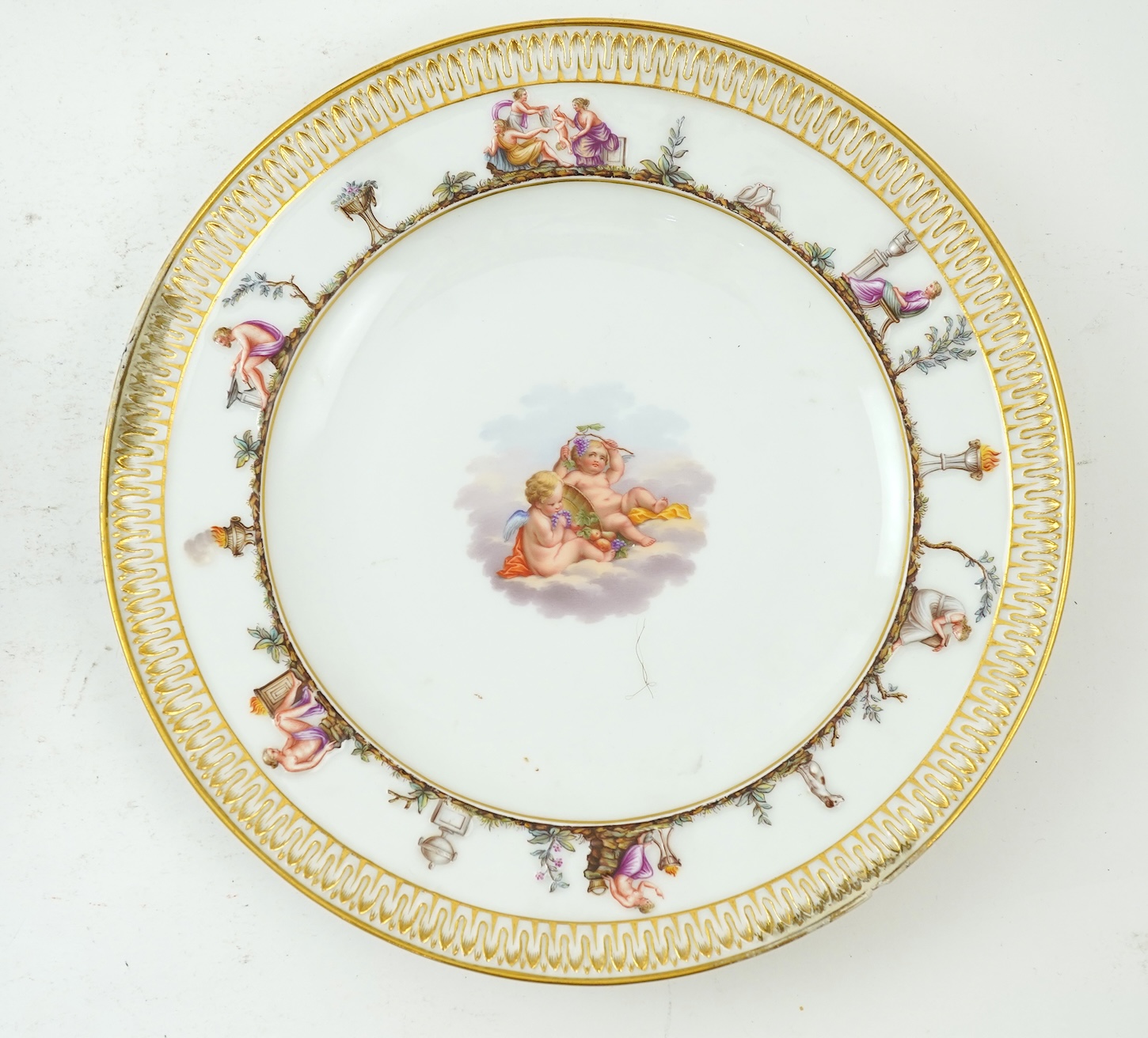 A set of six Meissen plates, decorated in the Capodimonte style, late 19th century